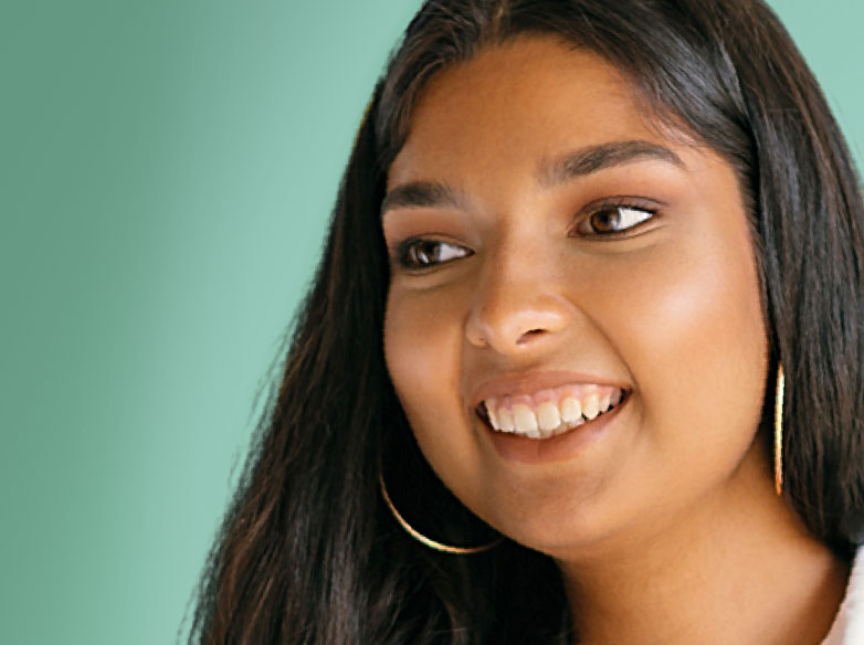 A woman smiling